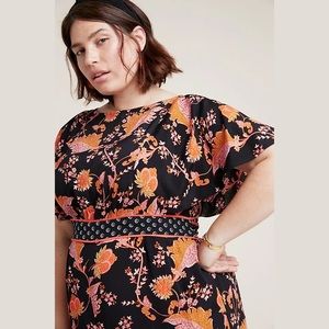 Anthropologie Orange and Black Floral Jumpsuit with Flutter Sleeves